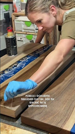 Applying oil to dry wood, dry coffee table covered with oil card