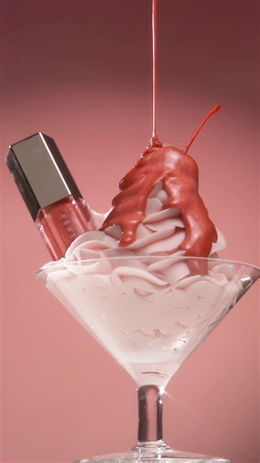 FENTY BEAUTY BY RIHANNA on Instagram: "Treat yourself to a drizzle of Fu$$y 🍧 Gloss Bomb in 'Fu$$y' is a shimmering dusty pink & the ultimate gotta-have-it lip gloss with explosive shine that feels as good as it looks 💖 One luscious swipe of Gloss Bomb makes your pout look instantly fuller, while Peptides, Shea Butter + Vitamin E lock in moisture, nourishing from within & strengthening your lips’ moisture barrier 👄 Shop the full range of Gloss Bomb at @ultabeauty, @sephora, @sephoracanada, @k