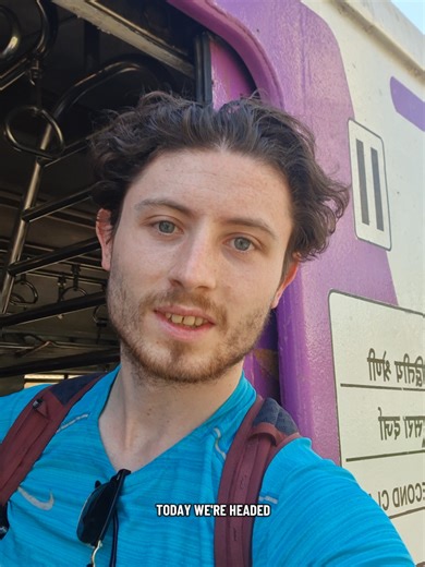 Is hanging out the side of a train door the human equivalent of a dog hanging out a car window? #mumbai #india #indiantrains #travel #backpacking