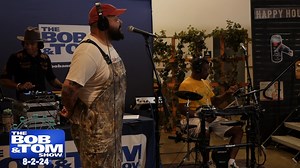Our house band today is hip hop artist Oreo Jones with DJ Action Jackson and drummer Clint Breeze, and he performs his song "Stevie Nick's House." | The Bob & Tom Show