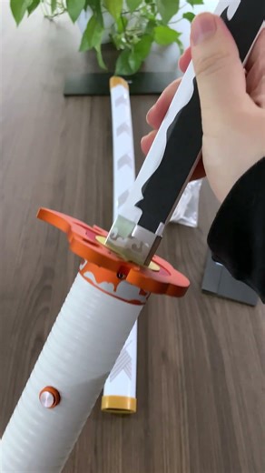 Unboxing Kyojuro Rengoku’s Flame Breathing Nichirin Sword #lightsaber #superneox #demonslayer