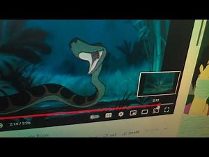 Kaa the snake laughing from the jungle book (1967) edited by Eli J. Martinez