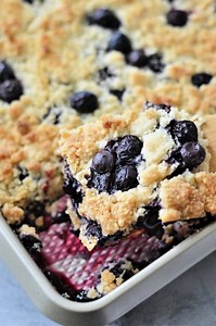 New! Easy Blueberry Ginger Cookie Cobbler. Summer blueberries baked beneath a soft, chewy brown sugar cookie topping with molasses and warm ginger. It’s like a gingery blueberry cookie in cobbler form! Delish! | Animal Lovers