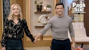 Kelly Ripa and Mark Consuelos show the weird way they hold hands