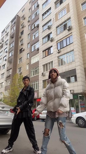 Coordinated Dance Routine on the Sidewalk