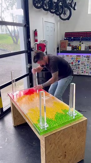 3.8M views · 99K reactions | When my daughters saw it, the first thing they said was “can we still eat them?” This was my first time using resin epoxy, and though I made countless mistakes, I think it came out pretty cool. What do you think? #candy #table #resin #epoxy #gummybear #gummibear #candytable | DadSocial | Facebook