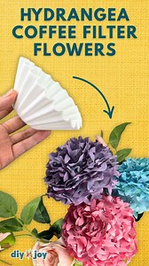 66 reactions | Turn coffee filters into these gorgeous hydrangeas! Easy and super fun to make. Give this DIY spring craft a try. Comment HYDRANGEAS for directions and a supply list. #paperflowers #paperflowerbouquet #paperflowerbackdrop #paperroses #papercraft #papercrafts #papercrafting #papercraftaddict #papercrafter #papercraftingideas #papercraftingaddict #papercraftideas #easycrafts #easycraftideas #diyflowers #asmrvideo #springcrafts #asmrsounds #asmrcommunity | DIY Joy | Facebook