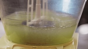 clip-1107959013-stirring-homemade-lemonade-machine-fair