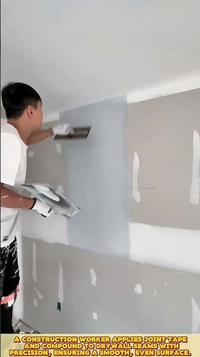 Skilled worker apply joint tape, smooth surface, and perfect wall seams