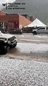 A hailstorm hit Telluride, CO, on Friday, blanketing the ground in ice and sending a small stream of floodwater rushing by. The person who took the footage said, "All the locals are taking video saying they never see this." | WeatherNation