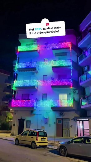 Colorful LED Lights on Multi-Story Building at Night