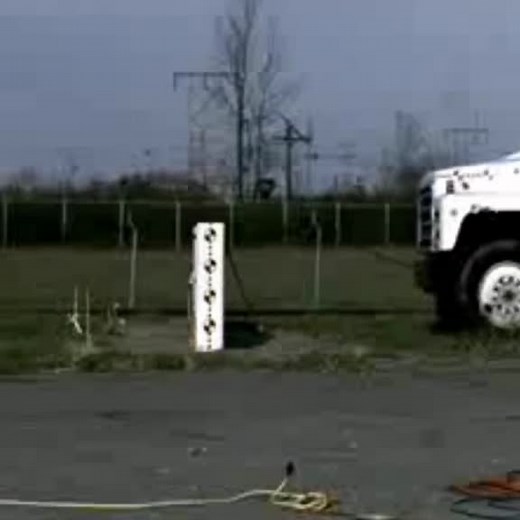 Unique Crash Test with Flatbed Truck in Action