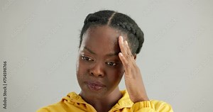 Face, embarrassed and reaction with awkward black woman in studio on white background for emotion. Portrait, frown and shy with young person feeling ashamed, guilty or uncomfortable by confusing news