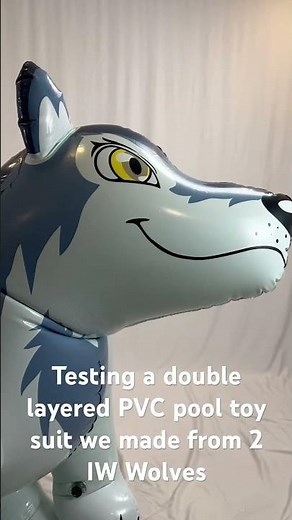 Testing a double layer, pvc wolf pool toy suit made from 2 IW Wolves.
