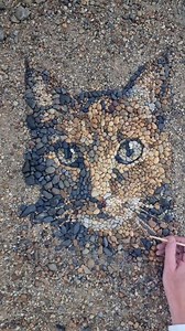 Justin Bateman, also known as Pebble Picassos, creates ephemeral realistic, naturalistic portraits from pebbles found on beaches. Unlike mosaics, the pebbles are not cemented on another surface for posterity, but are left on the beach to be washed away. | Museums News