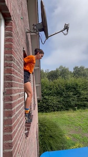Girl Jump From Window to Trampoline Then Bounce Back to Same Spot