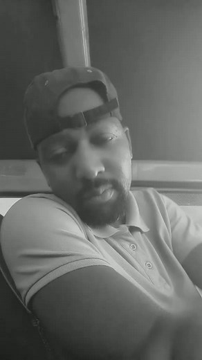 Captivating Black and White Video of a Seated Individual