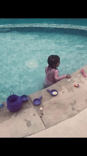 Maria Alice Enjoys Pool Playtime with Friends