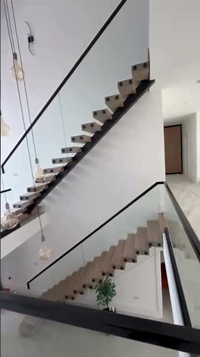 Straight Central Spine Staircase Design with Glass Balustrade | DDC London