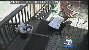 Female arsonist caught on video in California