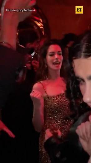 Entertainment Tonight on Instagram: "We can’t help but go 𝔀𝓲𝓵𝓭 over our dancing queen Anne Hathaway at the after-party for the Valentino Haute Couture Paris Fashion Week show. 💃😍 *Miracles happen* when you read all about her night with husband Adam Schulman at the link in bio."