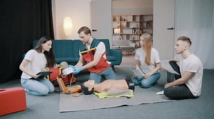 First aid cardiopulmonary resuscitation training demonstration, handheld