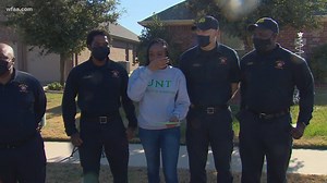 Dallas firefighters surprise daughter of fallen colleague, take part in graduation parade