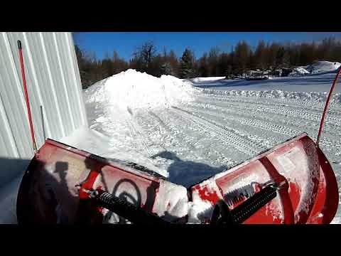 Can Am defender max limited with v plow pushing some snow