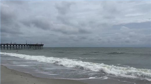 Approaching storm and gentle waves at Myrtle Beach, USA