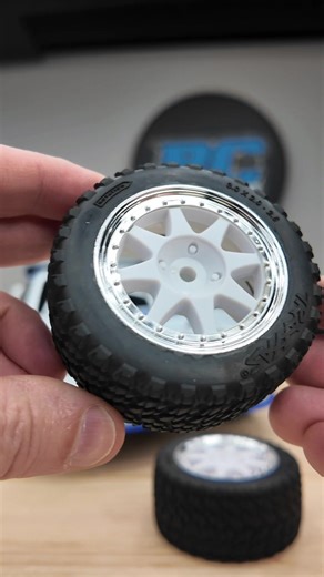 More wheel options are now available for the Traxxas Mini Rally! They have the rally tires on white rims with a chrome ring or the Speed Slick tires on black rims. Which do you like more? . . . #newtires #newwheels #traxxas #rally #rc