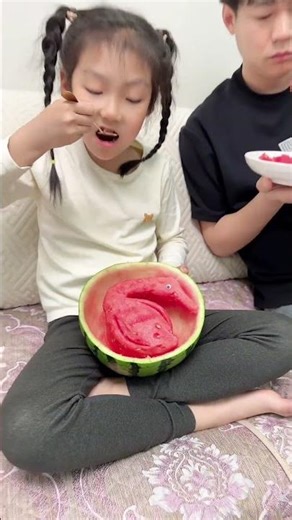 Half a watermelon, eating it and then finding a watermelon duck.