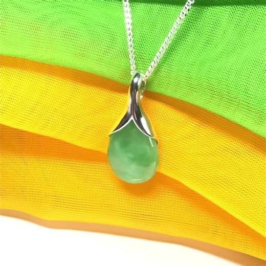 Really gorgeous real green jade pendant teardrop or pear shape, a really meaningful design necklace