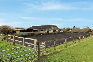A small farm set in 35 acres complete with paddocks, stabling, two arenas and mega views - Horse & Hound