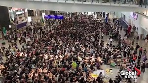 Demonstrators sing ‘Les Miserables’ protest song during sit-in at Hong Kong airport