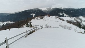 A frozen farm in the mountains - Free Stock Video