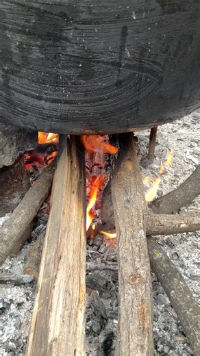 2.8K views · 36 reactions | Cooking up some traditional flavors over an open fire  #CookingVibes #TraditionalTaste | Cooking In Village | Facebook