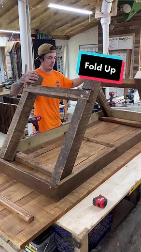 A couple of eyelets and a bungee helps secure the farmhouse legs under the table when folded up #farmhouse #diy #table #woodwork #fyp #hack