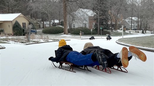 Take a sled ride down a neighborhood hill in North Raleigh