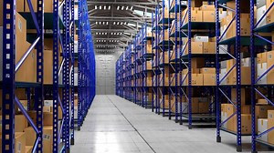 Packages on Shelves in Warehouse - Logistics, Shipping, Storage Concept.
