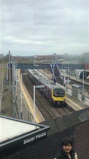 Class 360 on East midlands railway passes Hendon station for london recorded on sl10 bus