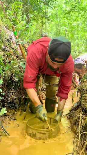 Prospecting in a Small Creek for Placer Gold Deposits