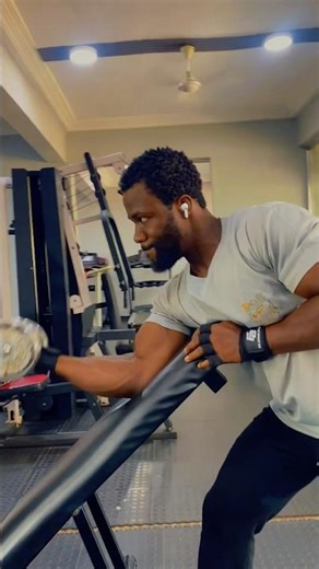 No preacher curl machine? Do This Instead with the dumbbells.