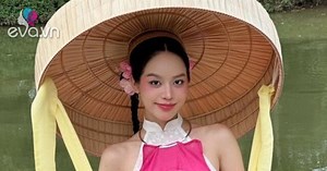 Hoa hậu Thanh Thủy khoe ảnh đón Tết sớm với áo dài cách điệu và nón ba tầm