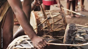 Zulu warriors drumming at a traditional ceremony