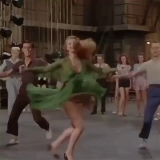 Portraying Terpsichore -the Greek muse of dance, Rita Hayworth whirls in a scene from "Down to Earth" (1947)