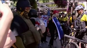 Marches by far-right, anti-fascist groups lead to clashes