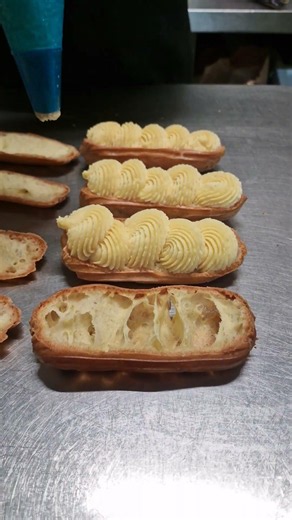Piping Our Vanilla Bean Crème Pâtissière into Fresh Éclairs 🤍 #eclairs