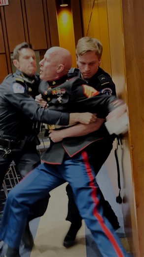 Anti-war protester dragged out of Senate hearing