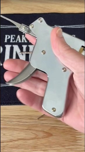 1075. Using a manual lock pick gun to open a rim cylinder door lock