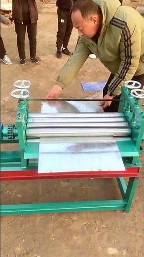 Demonstrating a Sheet Metal Rolling Machine (Slip Roller)
